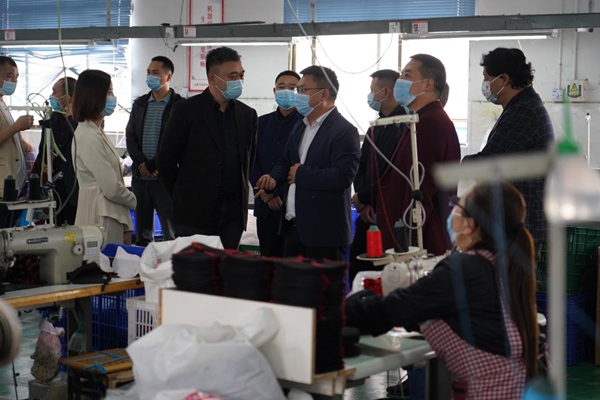 實(shí)地走訪。重慶市人力社保局供圖