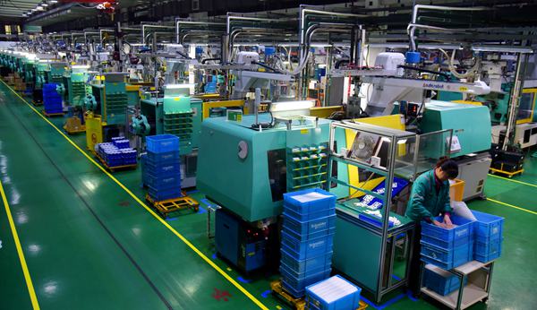 車間內(nèi)機器開足馬力。萬州區(qū)委宣傳部供圖