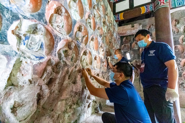 小佛灣修復(fù)現(xiàn)場。大足區(qū)委宣傳部供圖