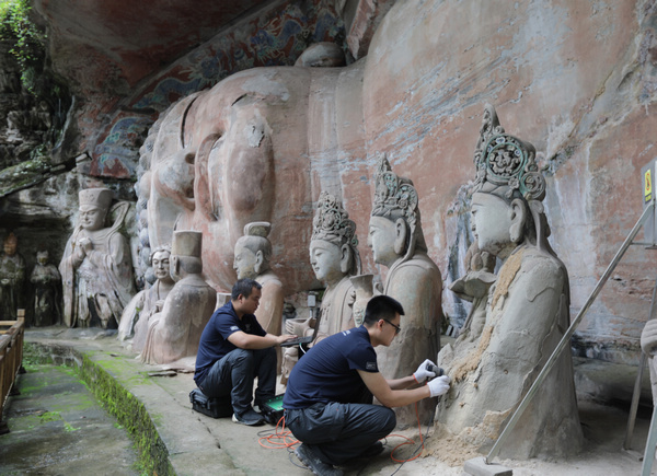 修復(fù)釋迦牟尼涅槃像。大足區(qū)委宣傳部供圖