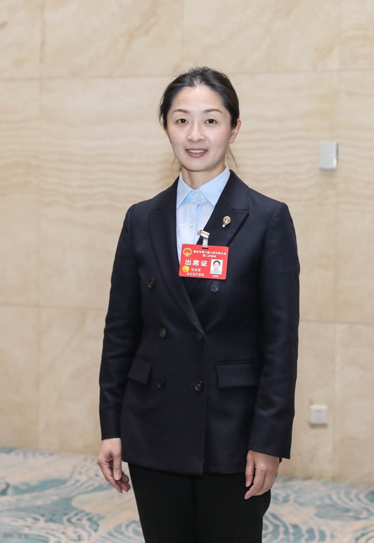 重慶市人大代表、重慶市羽毛球?qū)I(yè)隊(duì)（渝北隊(duì)）總教練張亞雯。受訪者供圖