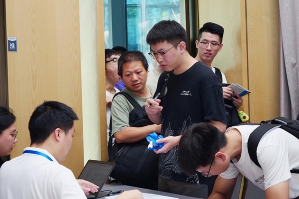 2024全國智慧醫(yī)保大賽決賽報到現(xiàn)場。主辦方供圖