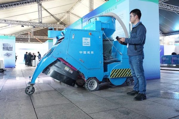 首屆建筑機(jī)器人大賽現(xiàn)場。重慶市住房城鄉(xiāng)建委供圖