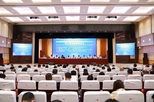 會(huì)議現(xiàn)場(chǎng)。九龍坡區(qū)社區(qū)教育學(xué)院供圖