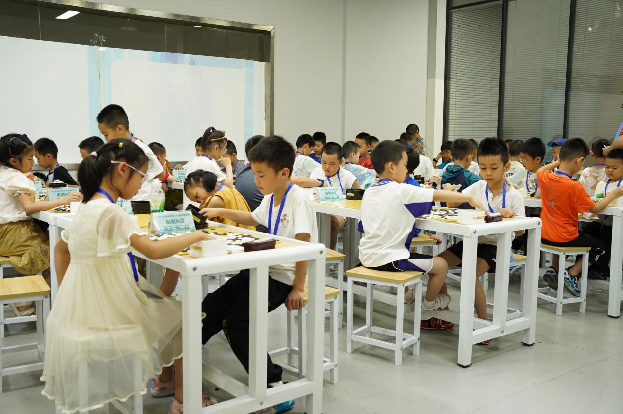 比賽現(xiàn)場。 重慶市江北區(qū)古力圍棋學苑供圖