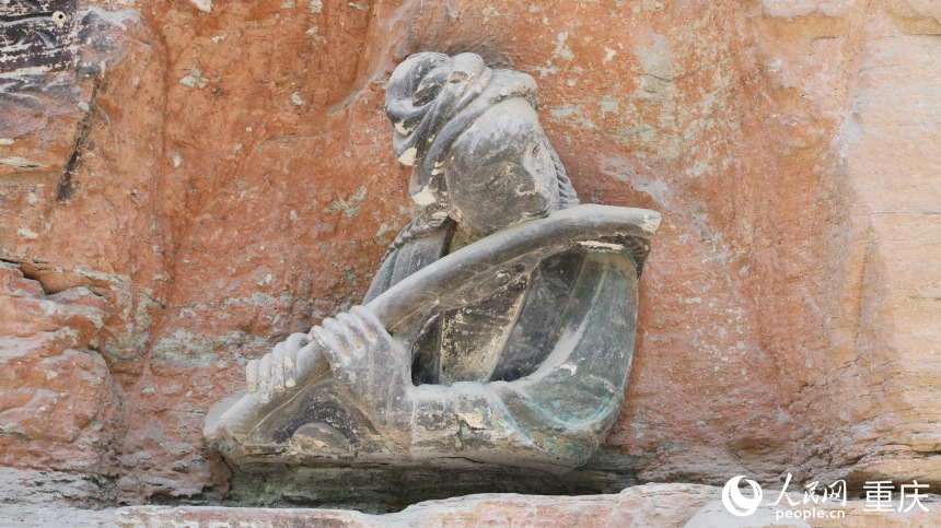 大足石刻“吹笛女”造像。人民網(wǎng) 曹欣悅攝