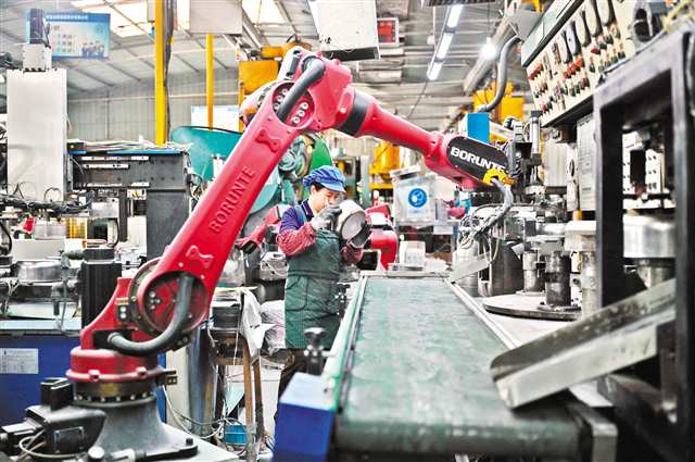 鴻全興業(yè)生產(chǎn)車間一角。記者 梅耀 攝/視覺重慶