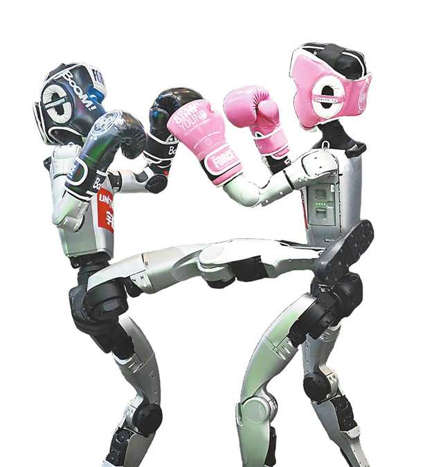 智能機器人展區(qū)，宇樹機器人正在進行拳擊比賽。