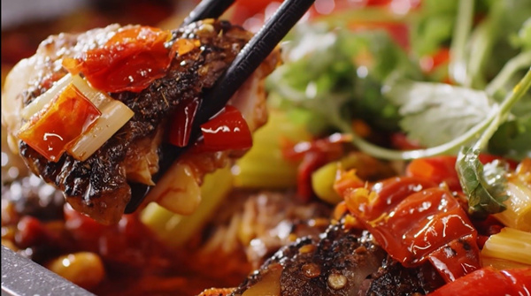 麻辣鮮香的萬州烤魚。萬州區(qū)商務(wù)委員會供圖